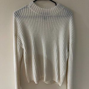 White ribbed mock neck sweater